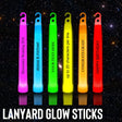 a row of neon colored glow sticks in the dark