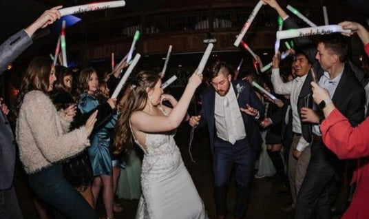 Led foam sticks lighting up at a wedding party